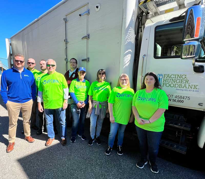 OVP Cares team in front of foodbank truck
